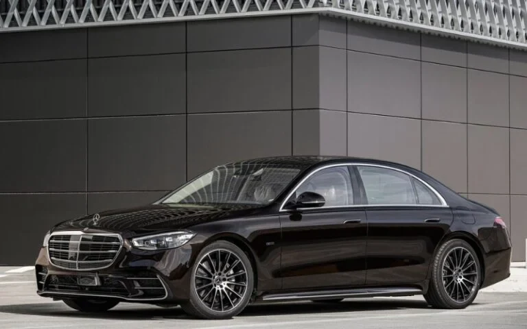 Black Mercedes-Benz S-Class luxury sedan parked outdoors