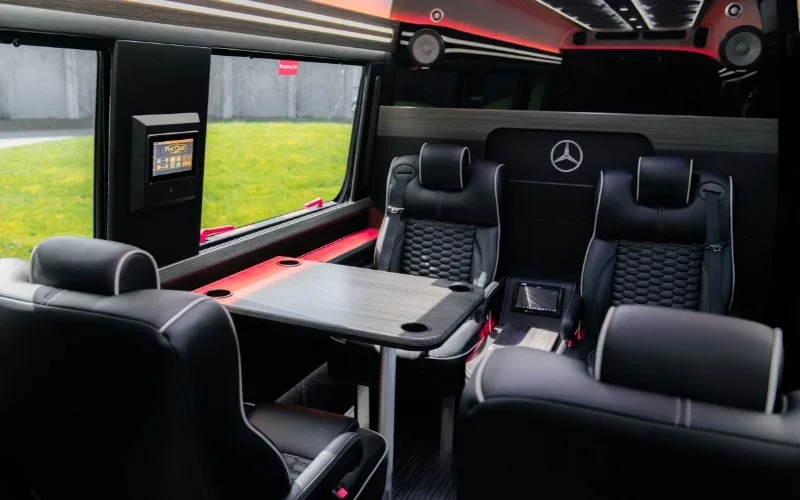 luxury Mercedes van interior with table.
