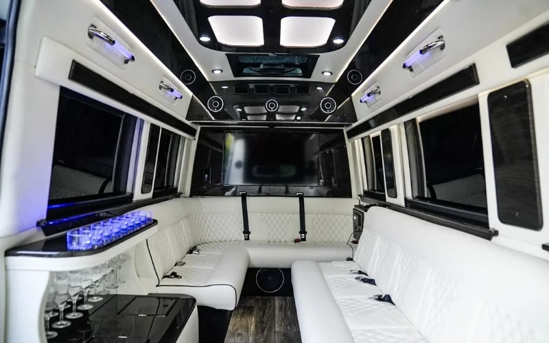 Luxury party bus interior with lounge seating for Columbus group event transportation