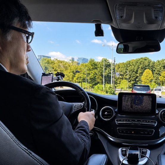 Luxury Rides LLC chauffeur driving a VIP client, as featured in Forbes